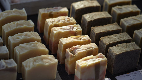 Assorted pieces of soap arranged on a surface